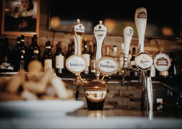 Beer taps and bar at Justino's